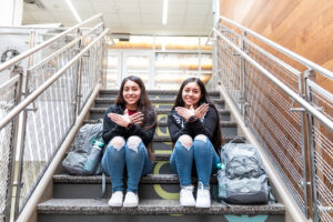ACC students on the stairs at the Elgin Campus.