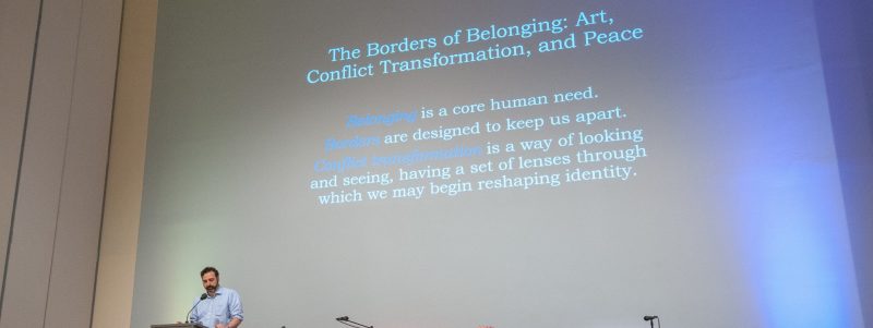 Peter Bonfitto introducing a symposium on the Borders of Belonging: Art, Conflict Transformation, and Peace