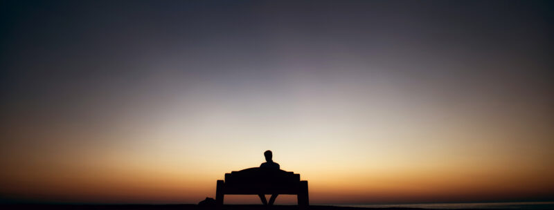 Silhouette of person at dusk